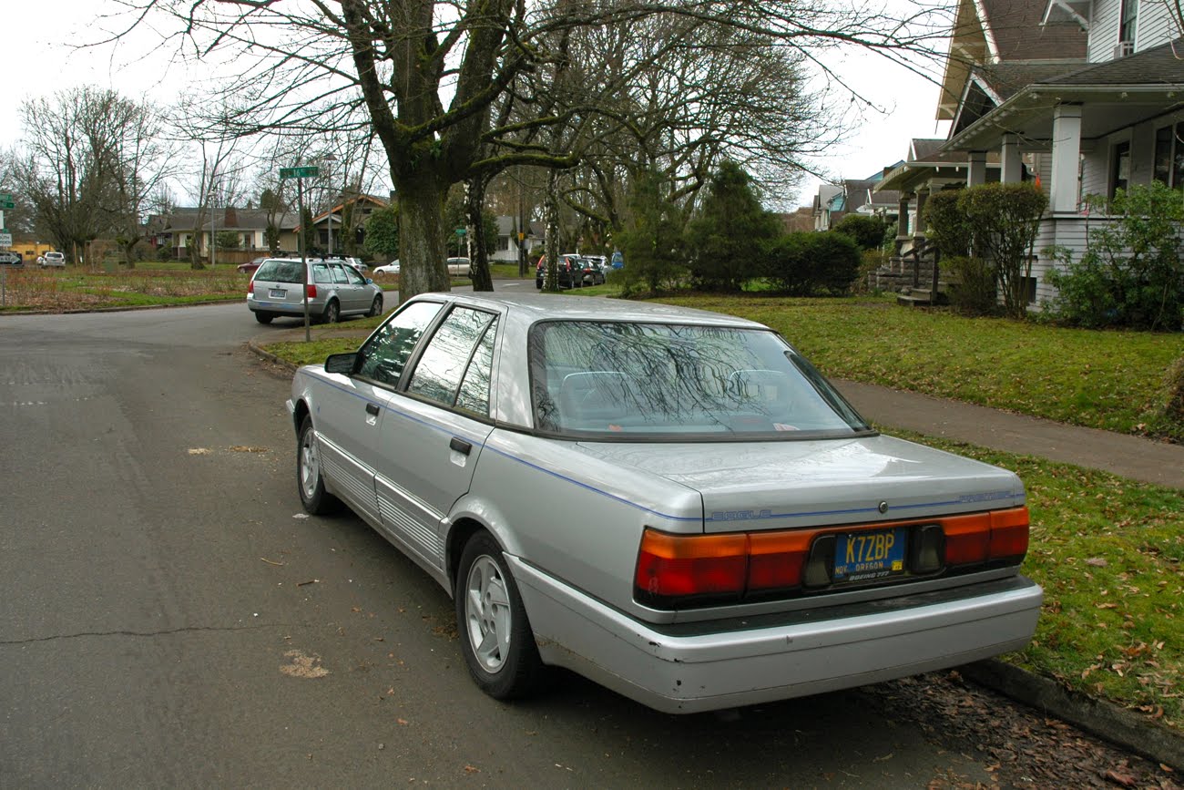 OLD PARKED CARS.: 1992 Eagle Premier ES.