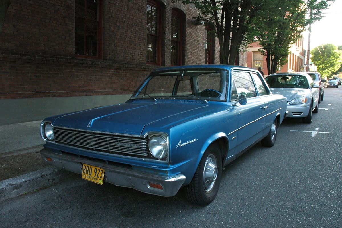 OLD PARKED CARS.: 1967 Rambler American 220.