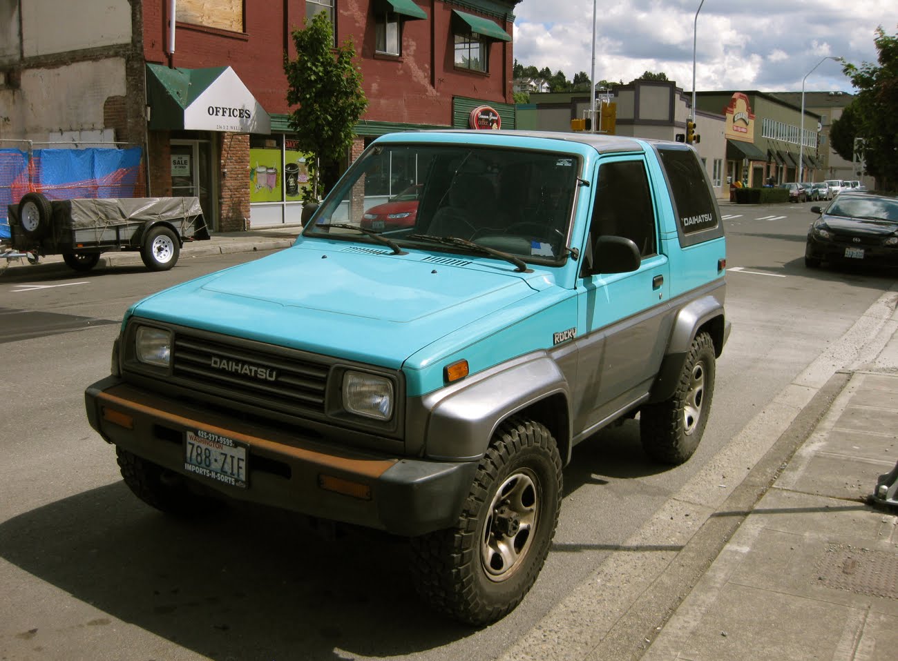 OLD PARKED CARS.: 1990 Daihatsu Rocky.