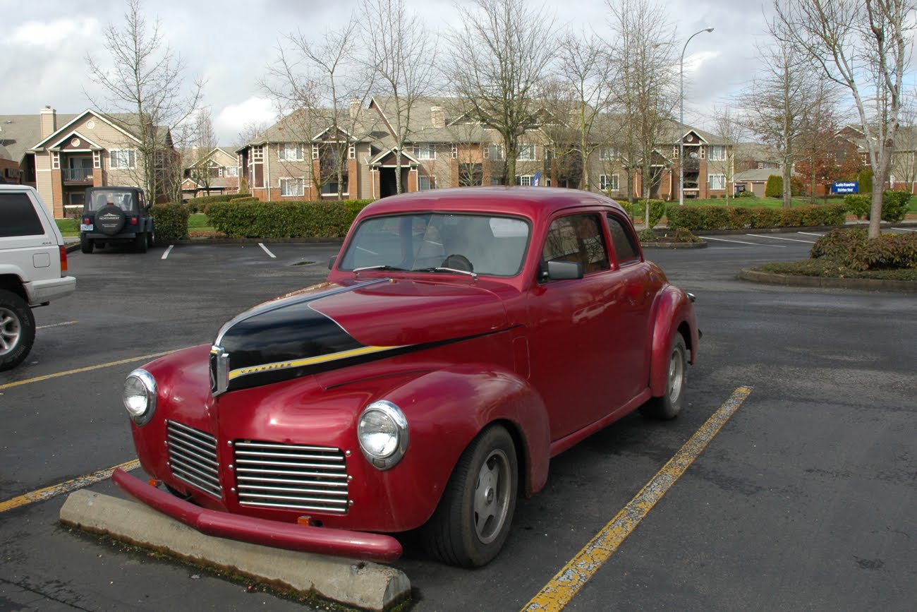 OLD PARKED CARS.: 1941 Studebaker Champion Coupe.