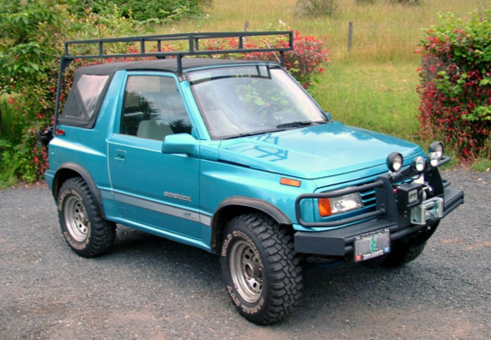Сузуки 1993. Suzuki Vitara 1 поколения. Suzuki Vitara Sidekick. Сузуки Витара кабриолет 1 поколение. Сузуки Витара 1990.