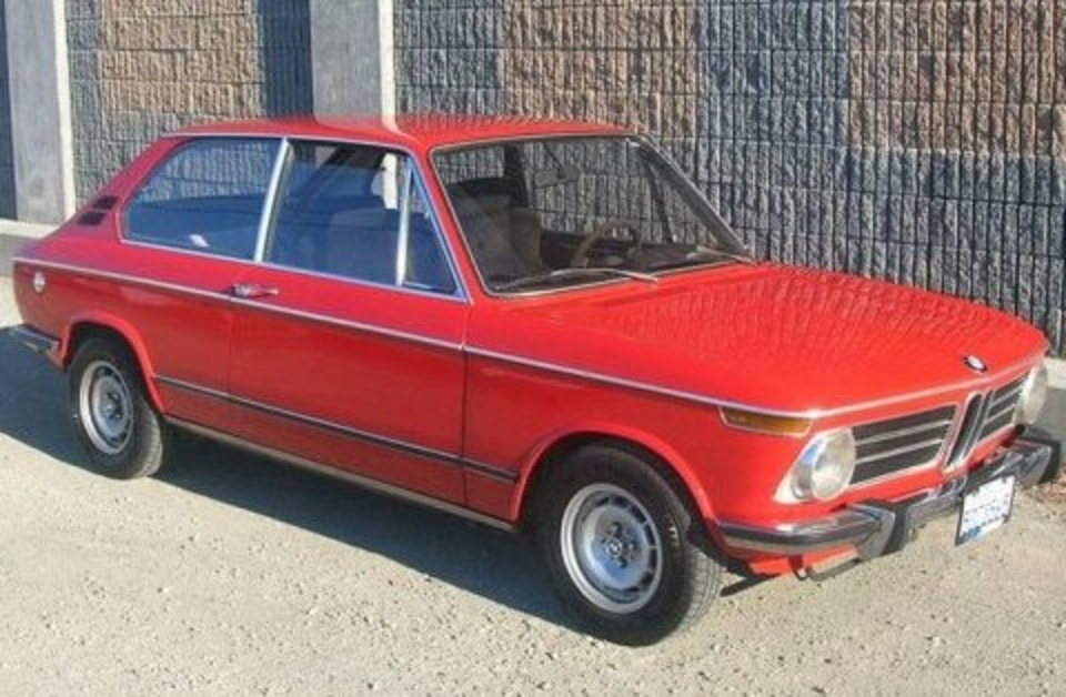 These BMW Tourings are rare and this one looks mostly original in Verona Red