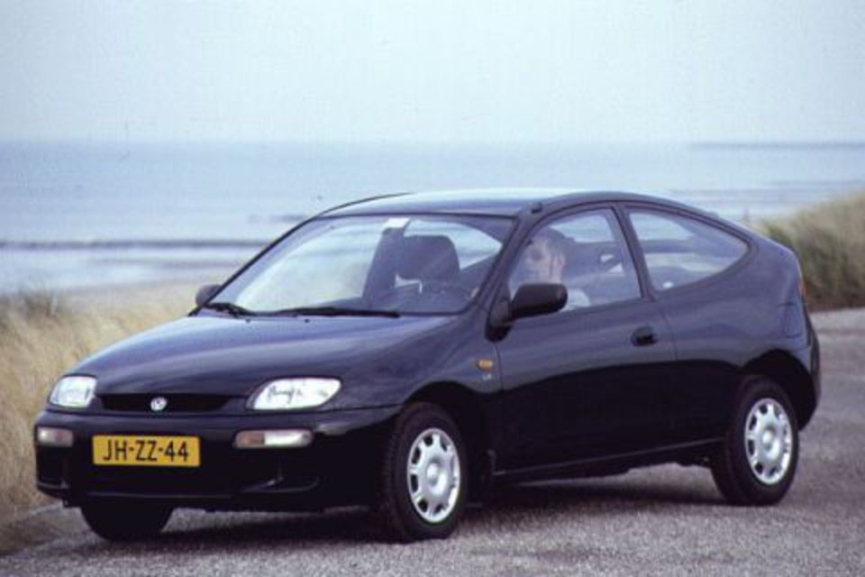 IMCDb.org: 1995 Mazda 323 Neo GS [BA] in "The Santa Clause 2, 2002"