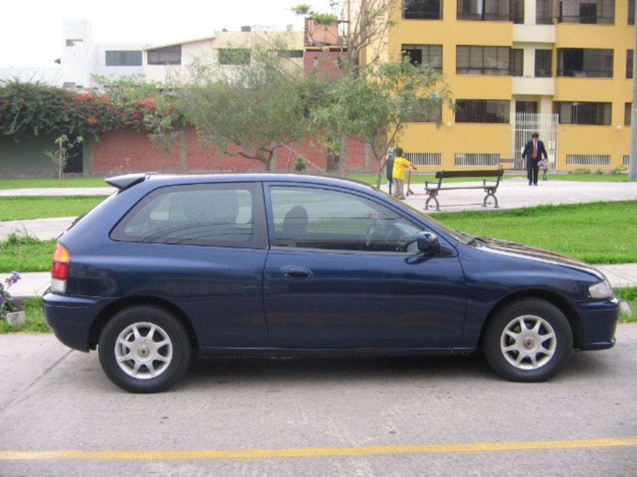 Marca: Mazda Familia Type C AÃ±o Fabric: 1997. Kilometraje: 55,400