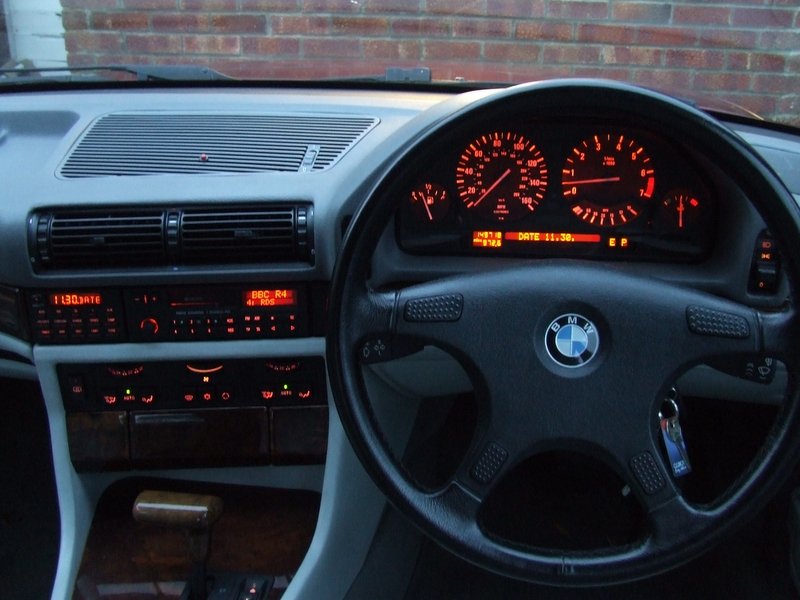 the E38 (the successor to the E32) have plastic lenses giving much