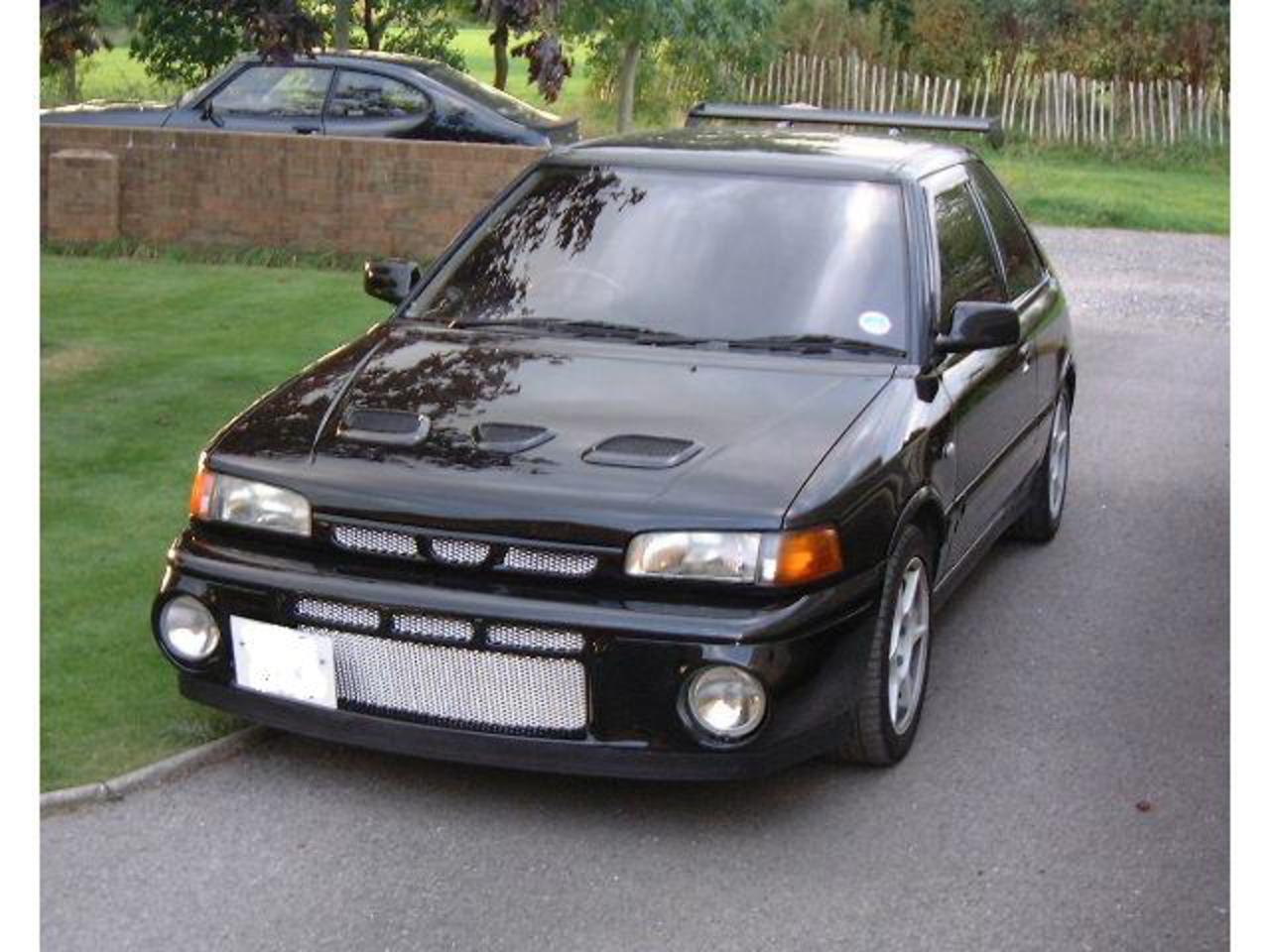 Mazda 323 GT - huge collection of cars, auto news and reviews, car vitals,