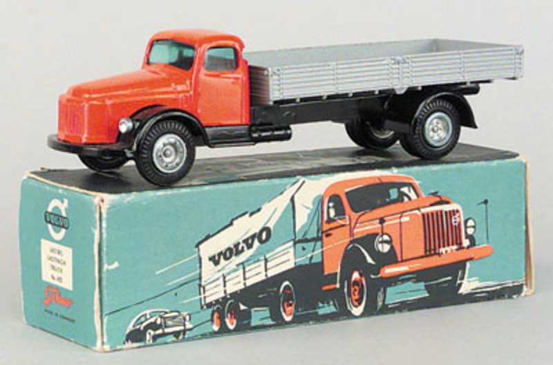 Tekno No.432 Volvo Flatbed Truck with sides - red cab, black chassis,