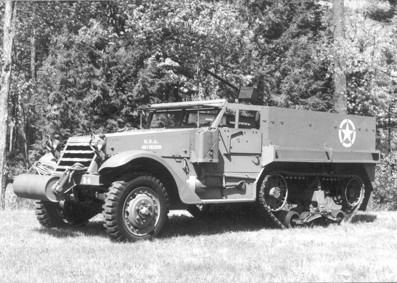 White Half Track. White Half Track. A military vehicle with a truck front