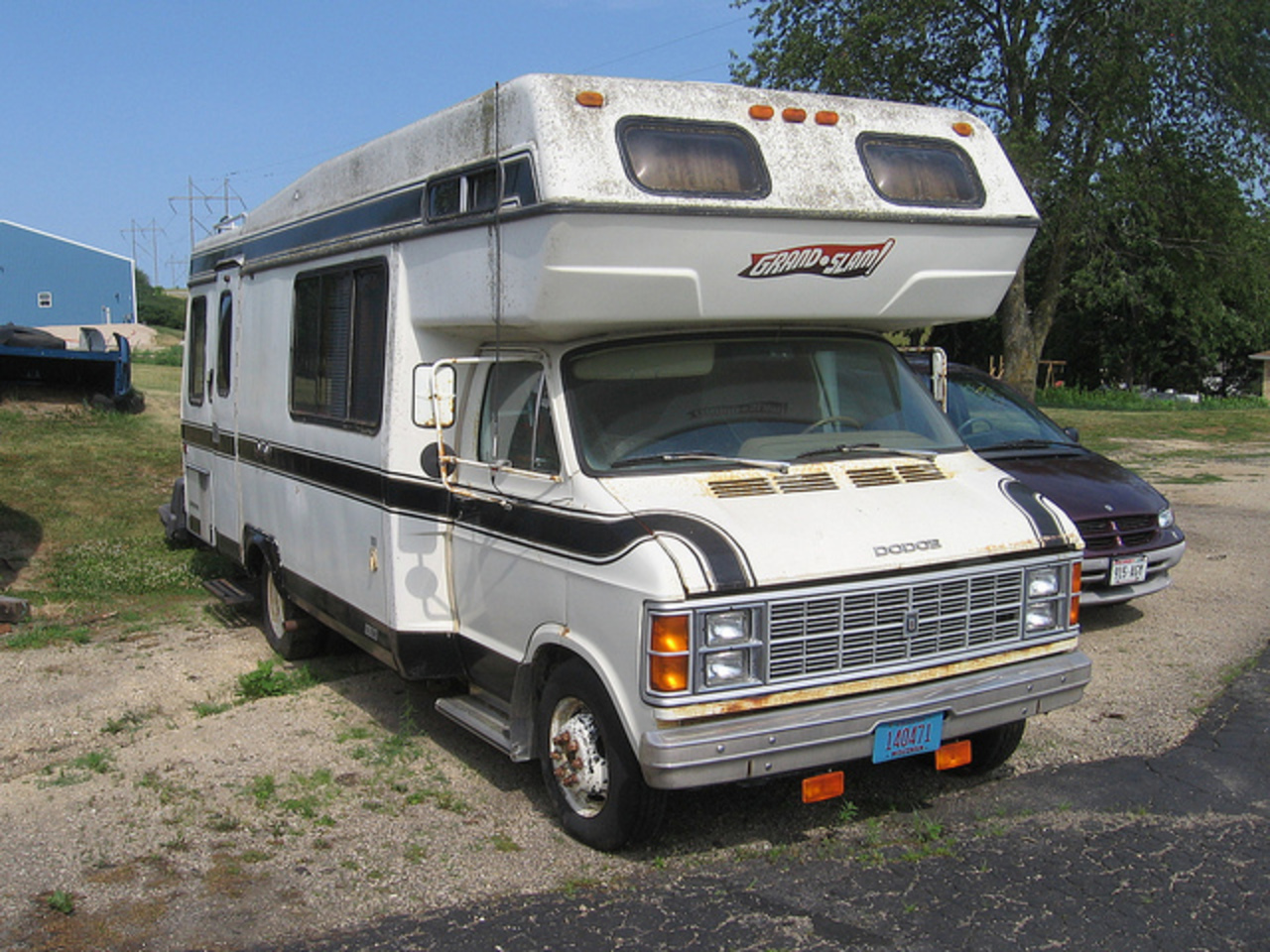 1979 Dodge camper. An older vehicle plucked down in the back of the lot.