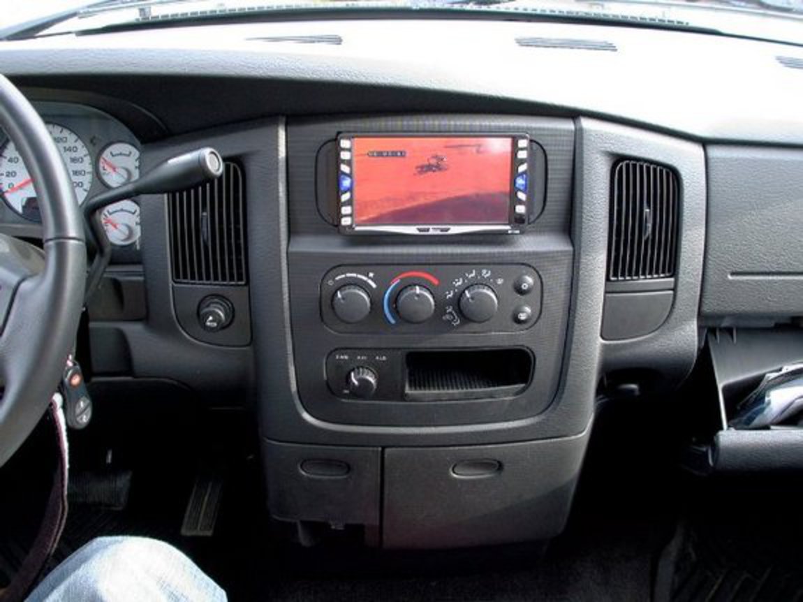 6 CD/DVD Changer under middle front seat. black_top_roller's 2005 Dodge Ram