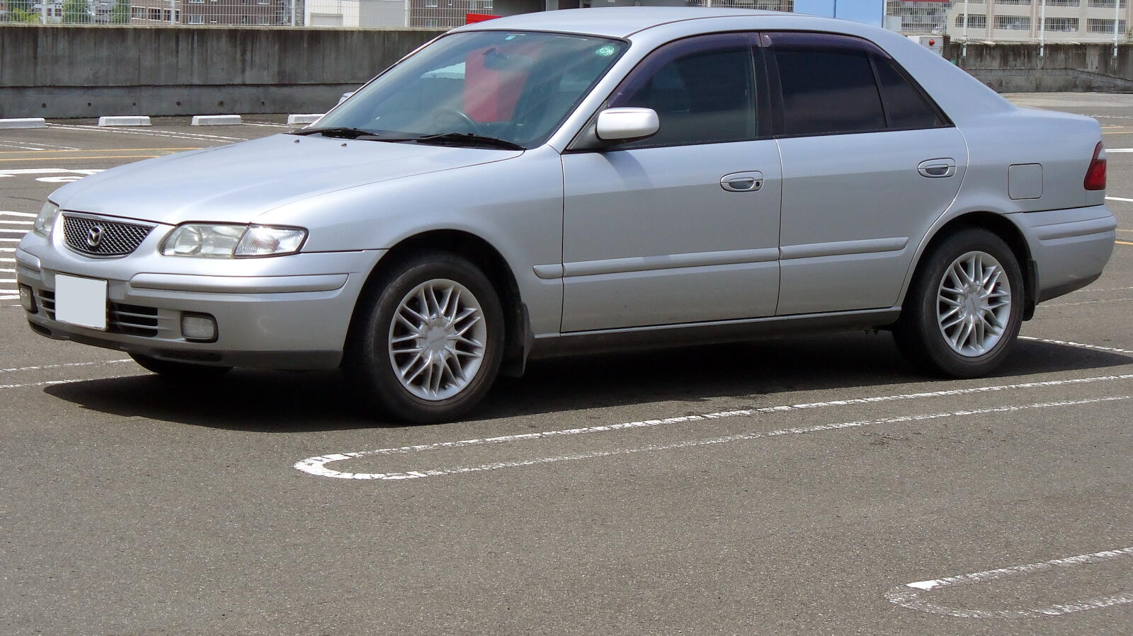 File:Mazda Capella sedan 1997 1.jpg