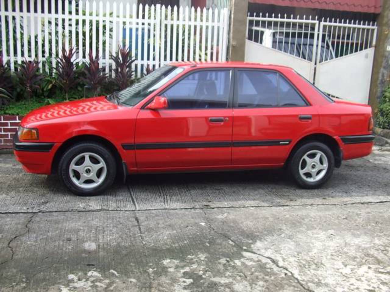 Mazda 323 LX 11 - huge collection of cars, auto news and reviews,