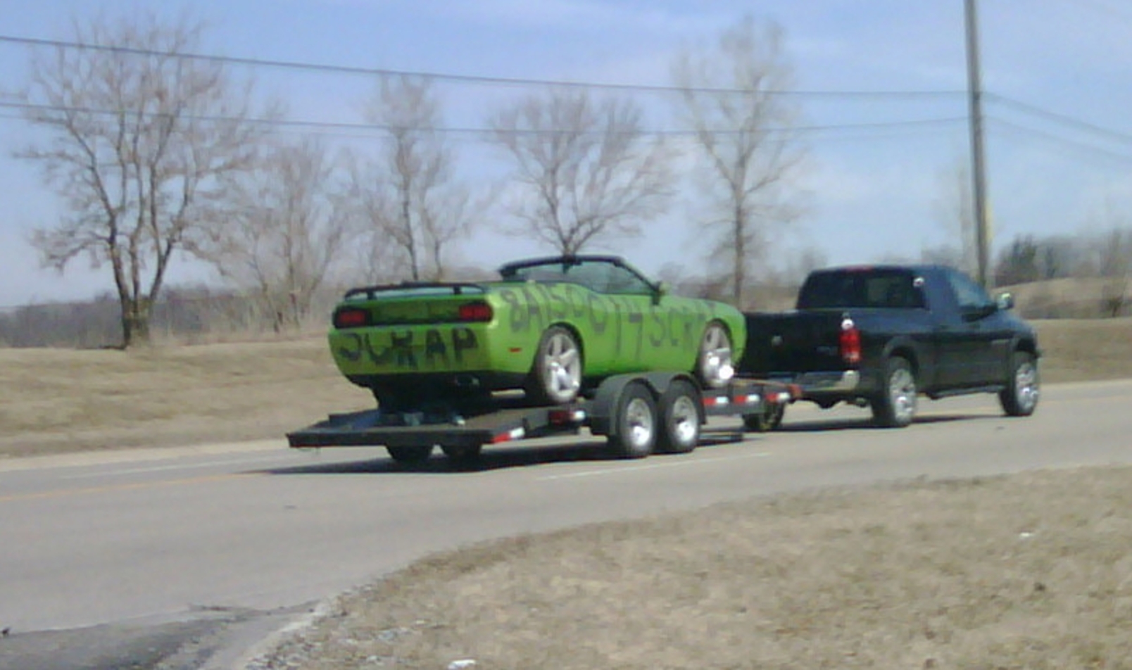 spotted a to-be-scrapped Dodge Challenger convertible in Sublime Green
