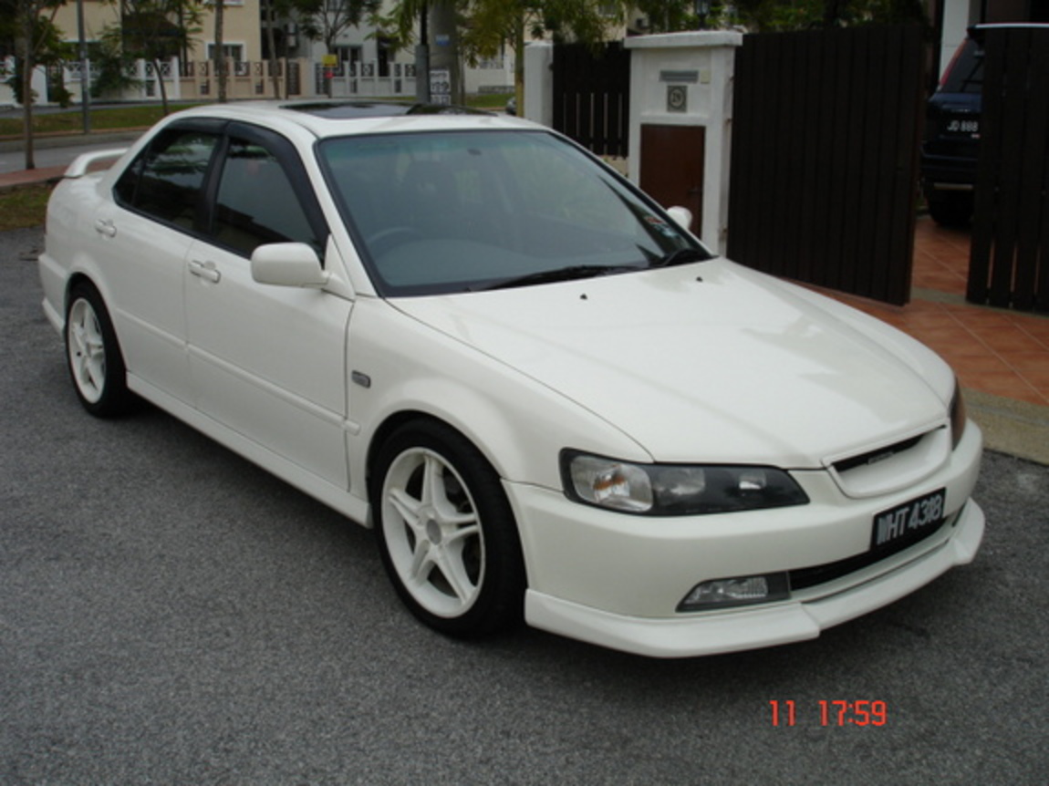 with K&N cone filter, Enkei wheels and Type-R high rear spoiler,
