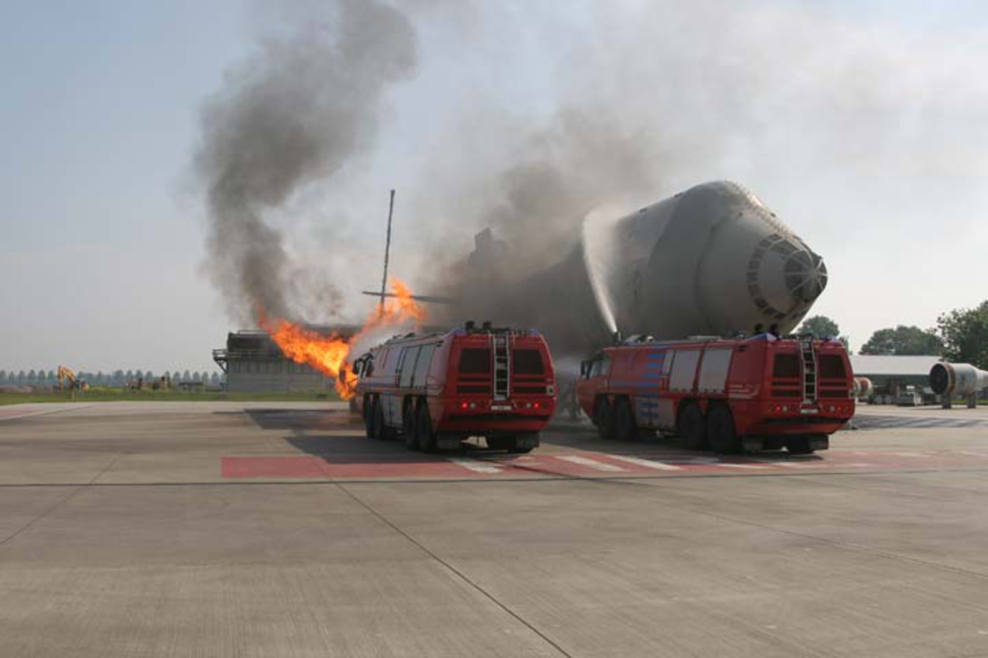 Fire Engines Photos - E-One crashtenders fighting a engine fire