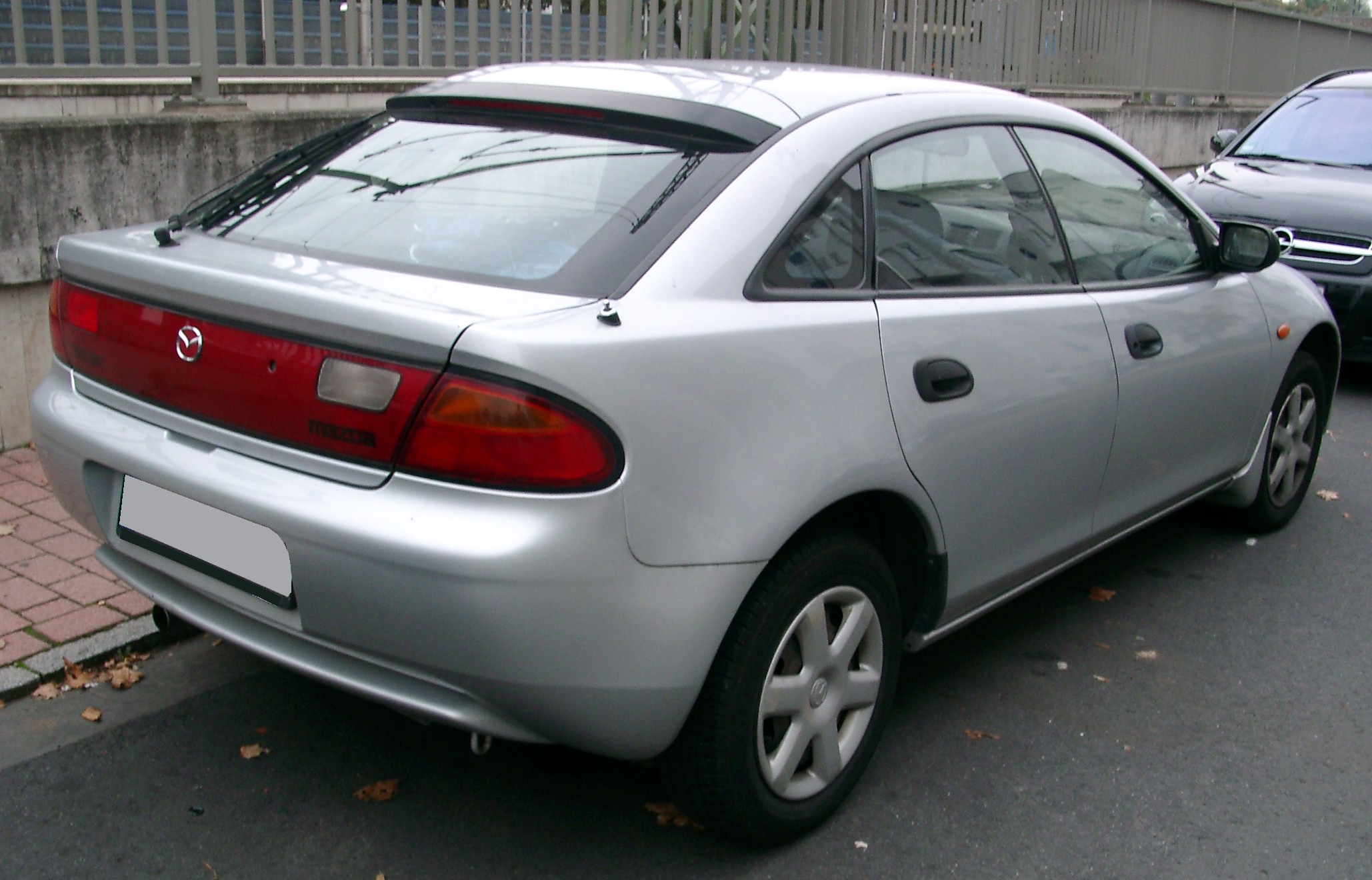 File:Mazda 323f rear 20071002.jpg - Wikimedia Commons