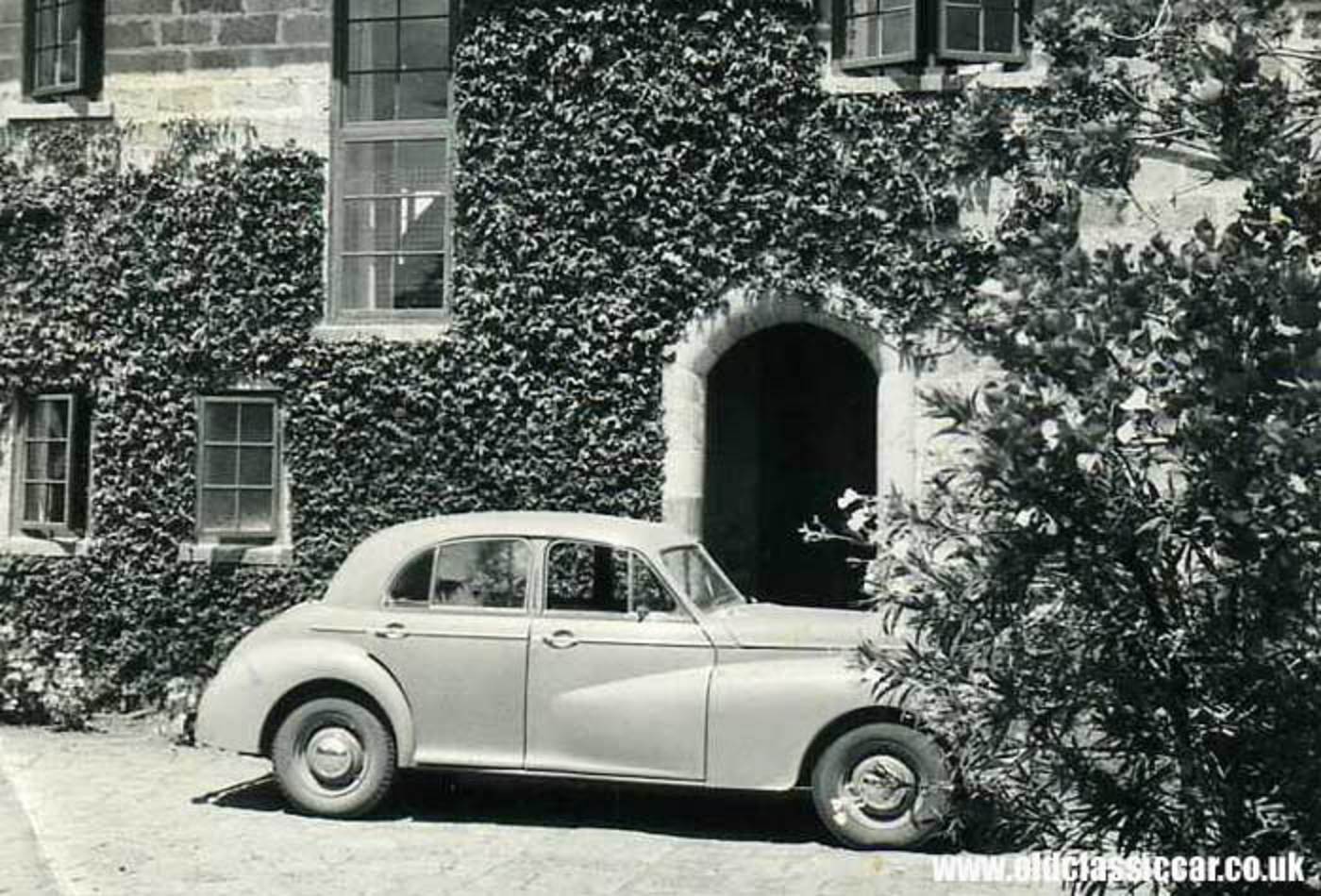 A Morris Six saloon parked outside a hotel