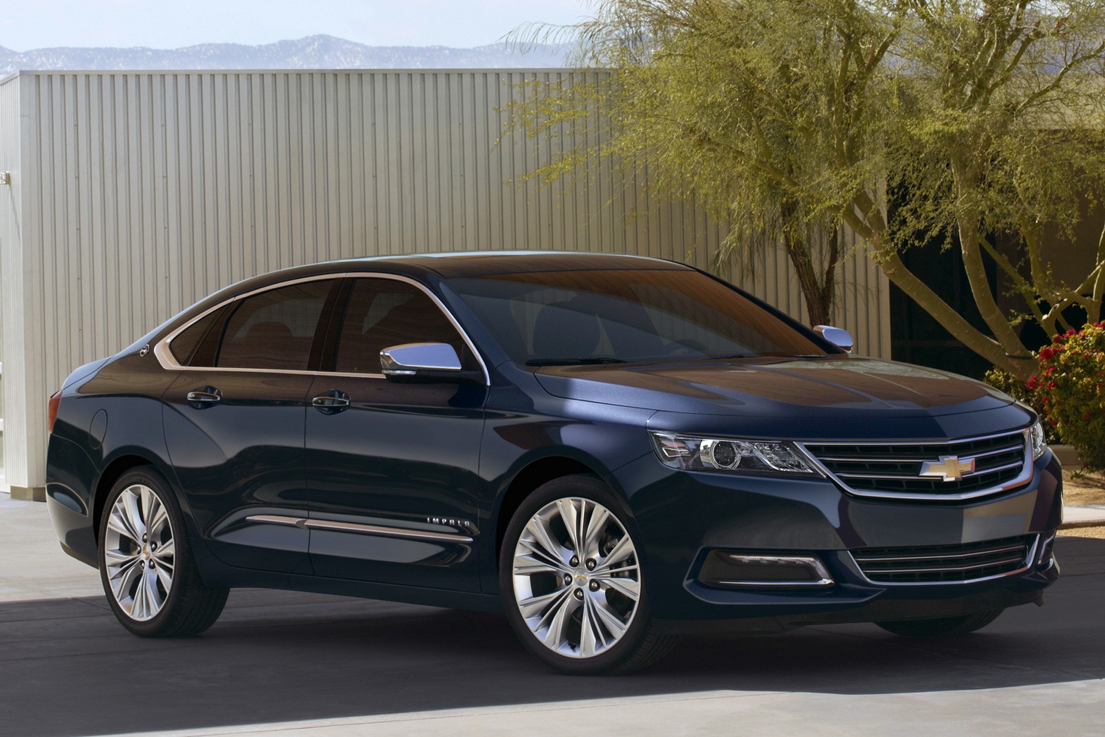 The 2014 Chevrolet Impala reminds me of a Chevy Malibu on Viagra â€“ but in a