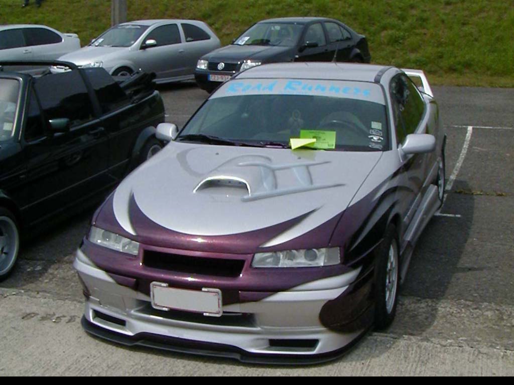 You can vote for this Opel Calibra photo