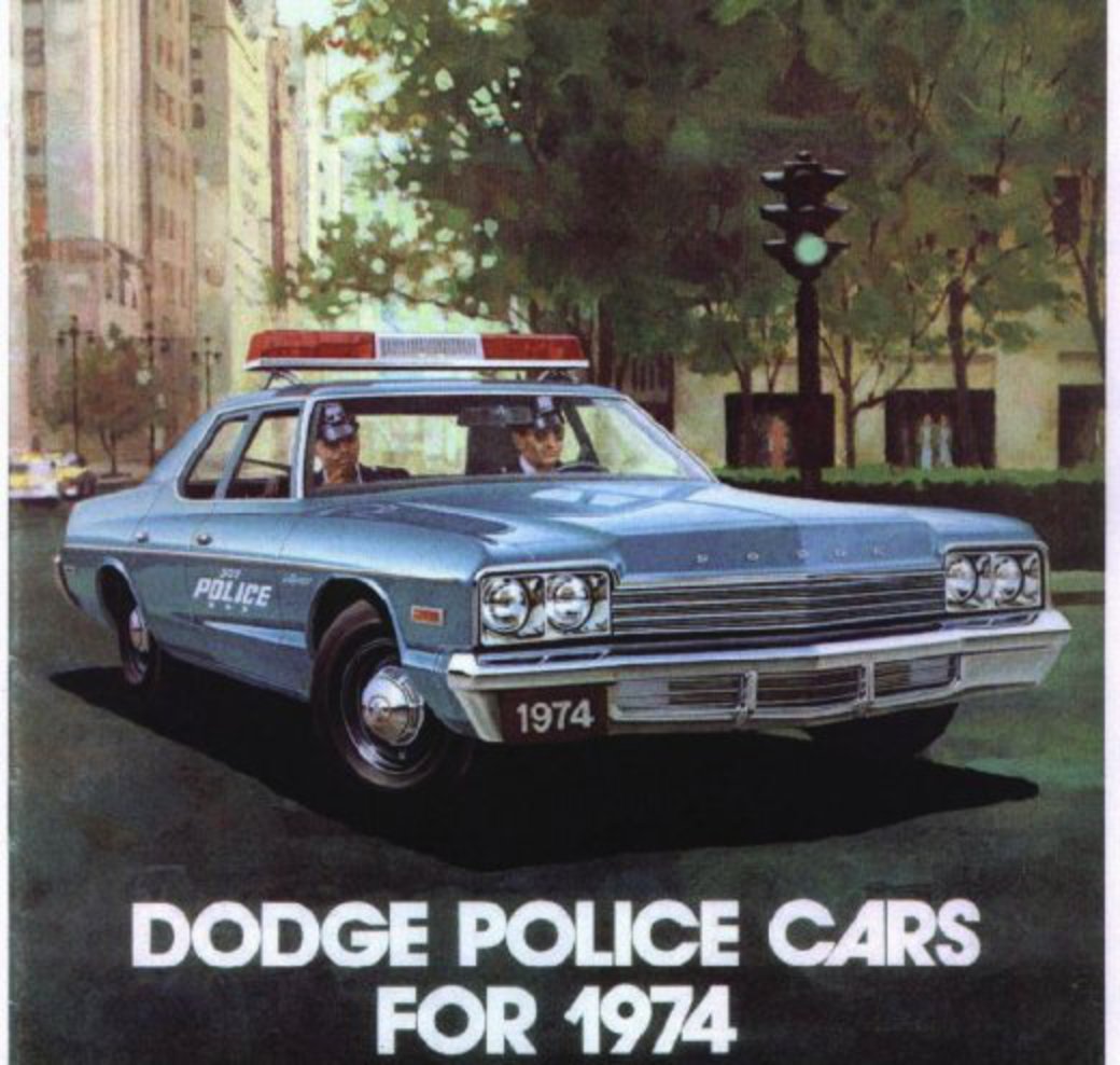 A 1974 Dodge Monaco Police Car. A Dodge Advertisement for their Monaco