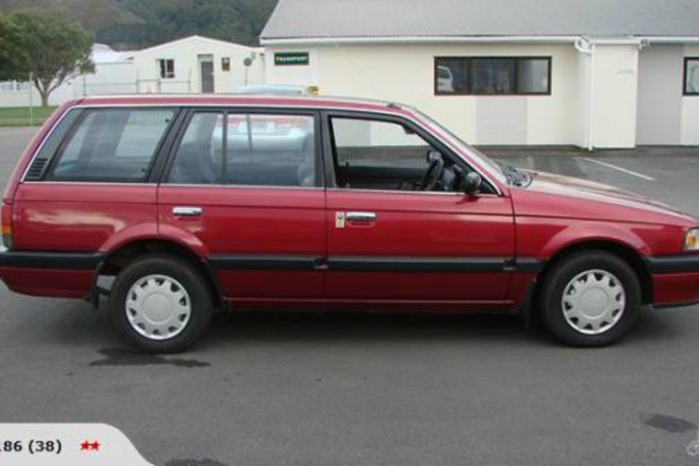 â€œMazda 323 GLX wagon 1995â€. Photo may not be of this vehicle but of a
