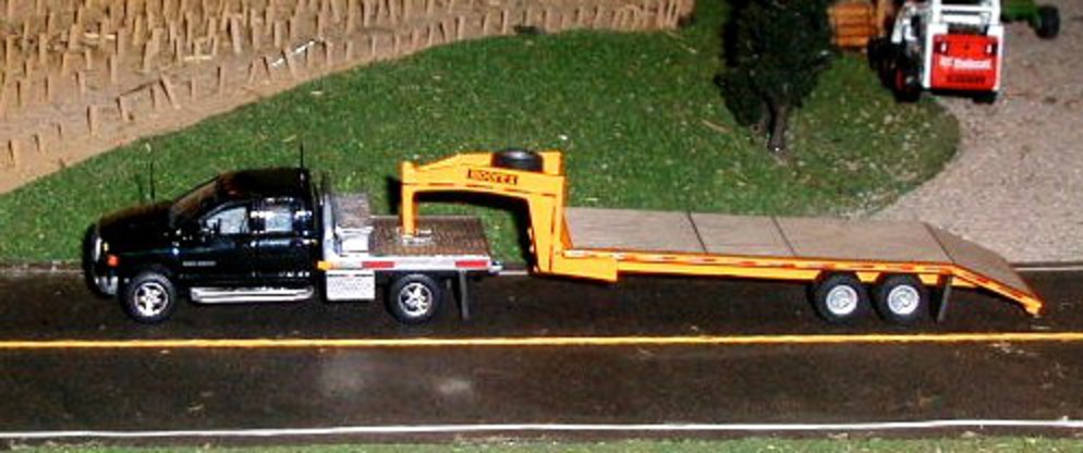 DODGE 2500 WITH 8' FLATBED AND 24' TRAILER