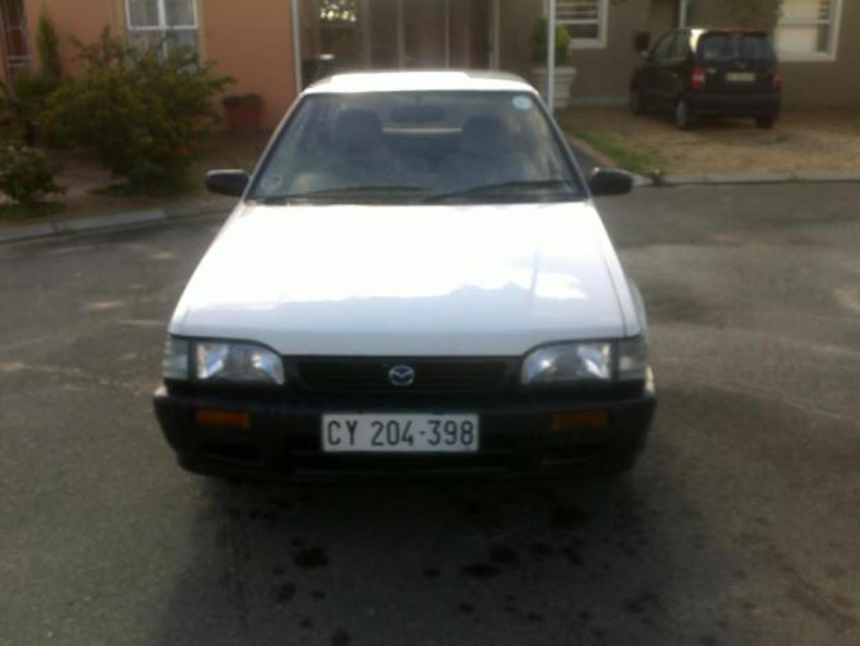 Pictures of 2001 White Mazda 323, 1300 for sale