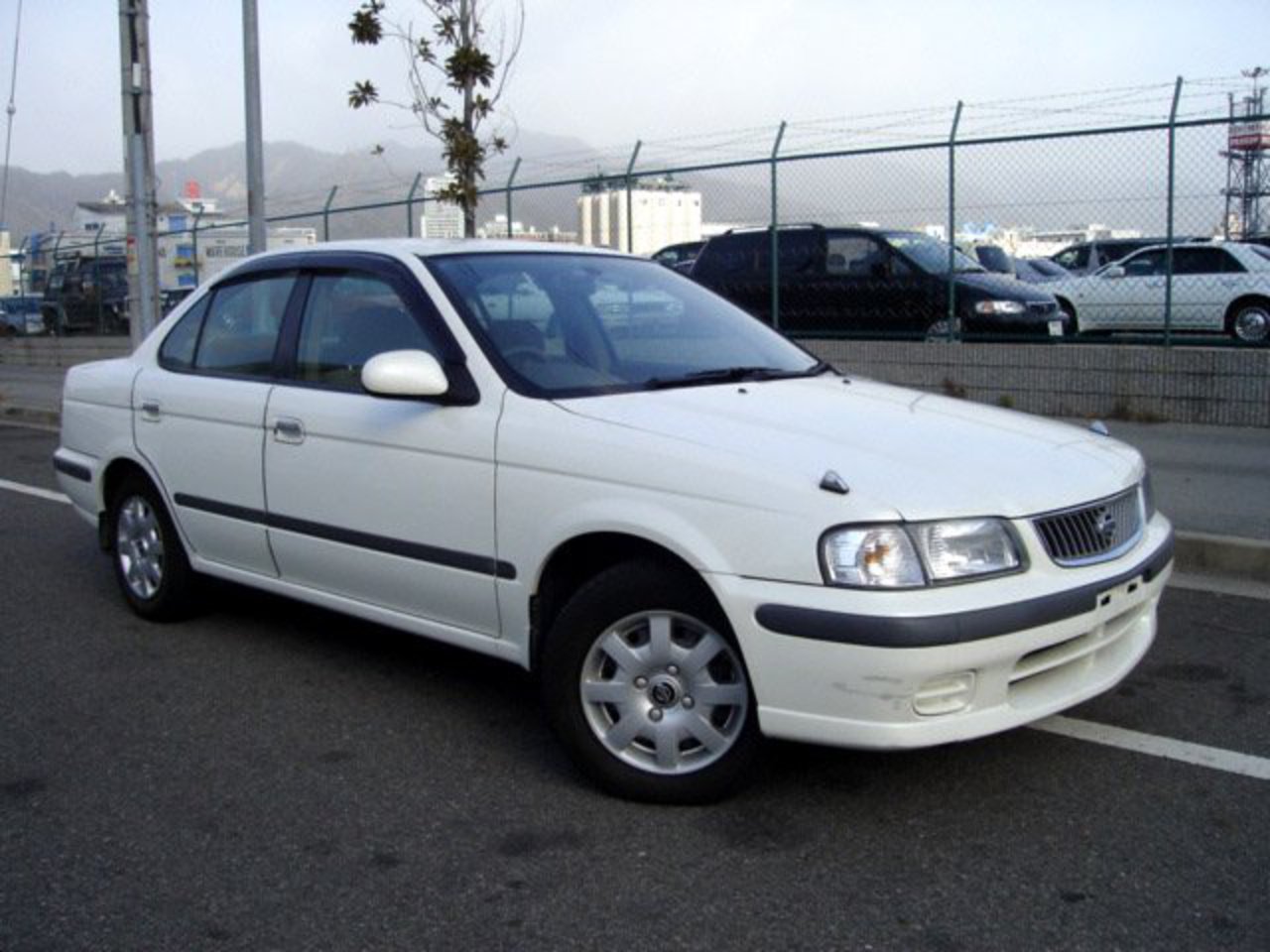 Nissan Sunny Super Saloon Limited â€” a model manufactured by Nissan.