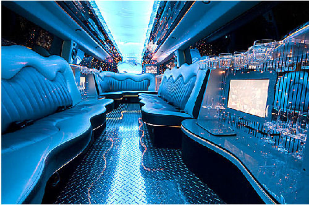Chauffeur stretched black Hummer H2 limousine hire interior in Glasgow,
