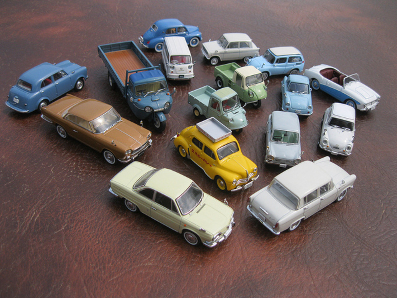 Clockwise from top centre: Hino PA62 (Japanese-built Renault 4CV derivative,