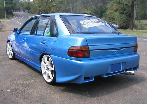 Ford Laser Ghia 15 Sedan - specs, photos, videos and more on TopWorldAuto